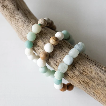 bracelets-aguas-infinitas-set-on-driftwood.jpg