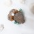 bracelet-jewels-on-the-sand-close-up.jpg