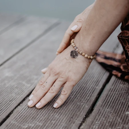 bracelet-in-the-embrace-of-mother-earth-on-hand.jpg