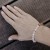 bracelet-desert-rose-on-hand.jpg