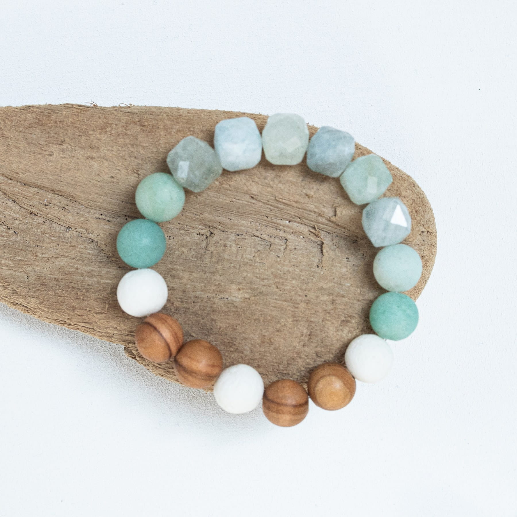 bracelet-jewels-on-the-sand-top-view.jpg
